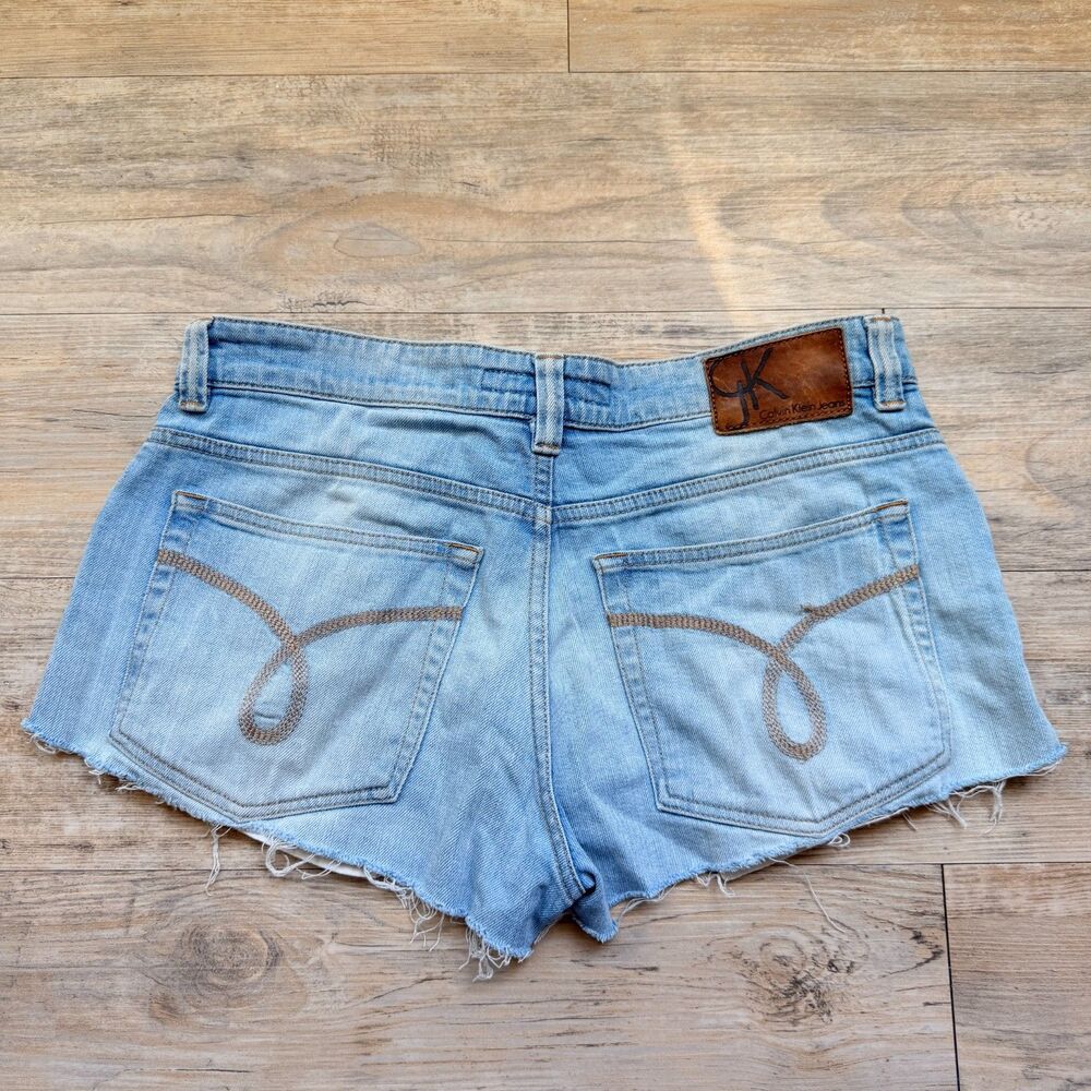 Vintage Calvin Klein Jeans Denim Cutoff Shorts 31 Women's Light Wash Raw Hem Y2K